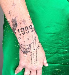 a woman's hand with a tattoo on her left arm and the word hope written in it