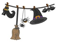 a black witch hat hanging from a clothes line with bats and pumpkins on it