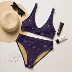 Get ready for compliments all summer long with this uniquely designed sustainable "Mystical Moon & Stars" high waisted bikini set. Enjoy the smooth fabric and the flattering design, and show it off at the beach or by the pool! Removable pads and its double-layer make it comfy to wear all day by the pool or beach. It's made from soft recycled polyester with double-layering and UPF 50+. * Soft and stretchy material with UPF 50+ * Sizes up to 6XL * Bikini top comes with removable padding for comfor Gothic Swimsuit, Mystical Moon, Nice Bikinis, Cute Bikinis, Moon Stars, Style Expert, Sustainable Fabrics, Sun And Moon, Stars And Moon