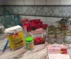 the ingredients are on the counter ready to be put into the jar for making raspberry muffins