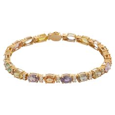 Bracelets are worn to enhance the look. Women love to look good. It is common to see a woman rocking a lovely gold bracelet on her wrist. A gold gemstone bracelet is the ultimate statement piece for every stylish woman. Adorn your wrist with this beautiful multi-sapphire and diamond prong set charm bracelet in 14 Karat Gold. Each piece is handmade with a unique shape of precious stone. This elegant and lightweight bracelet is perfect for everyday wear. PRODUCT DETAILS :- Material - 14K Solid Yel Sapphire Tennis Bracelet, Bracelet With Diamonds, Red Sapphire, Bracelet Tennis, Modern Bracelets, Gold Armband, Multi Sapphire, Sapphire Bracelet, Citrine Gemstone