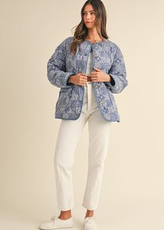 Long sleeve paisley bandana print with denim chambray lining quilted button down jacket with front pocket details. 100% Rayon. Model is wearing a size S. Bandana Quilt, Paisley Bandana, Button Down Jacket, Satin Ribbon Bow, Knit Bottom, Football Tees, Bandana Print, Striped Cardigan, Love Is Free