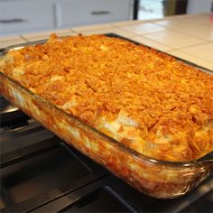 a casserole dish sitting on top of an oven