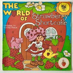 an old children's book about strawberry shortcakes with the title, the world of strawberry shortcake