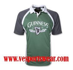 a green and white shirt with guinness on it