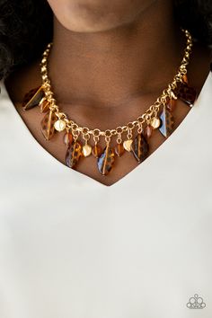 A collection of glistening gold beads, dainty brown acrylic beads, and spotted brown acrylic beads swing from the bottom of a shimmery gold chain, creating a wild fringe below the collar. Features an adjustable clasp closure.

Sold as one individual necklace. Includes one pair of matching earrings. Cheetah Necklace, Short Gold Necklace, Paparazzi Accessories Jewelry, Hissy Fit, Brown Acrylic, Brown Necklace, Wooden Bracelet, Gold Bead Necklace, Paparazzi Accessories