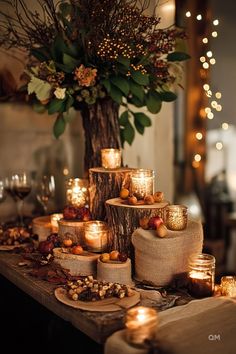 Rustic Fall wedding table decor with candles, burlap, and natural elements like tree stumps and leaves, creating a warm, romantic autumn atmosphere. Boho Fall Wedding Tablescapes, Wedding Decor Ideas Boho, Autumnal Wedding Table Decor, Fall Wedding Fireplace Decor, White Pumpkin Wedding Decor, Small Fall Wedding Ideas, Rustic Fall Wedding Centerpieces, Fall Boho Wedding Decor, Boho Wedding Theme Ideas