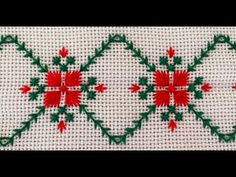 a cross stitch pattern with red and green flowers