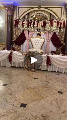 a banquet hall decorated with white and red decorations