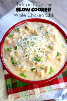 a red bowl filled with white chicken chili