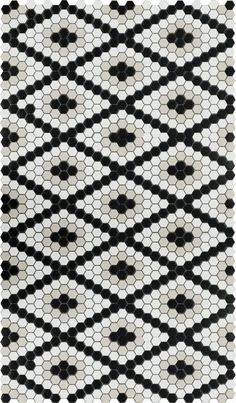 a black and white rug with hexagon tiles on it, in the shape of an abstract pattern