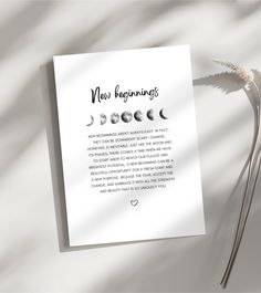 a sheet of paper with the words new beginnings written on it next to a plant