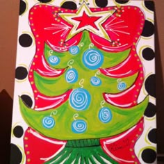 a painting of a christmas tree on a polka dot background