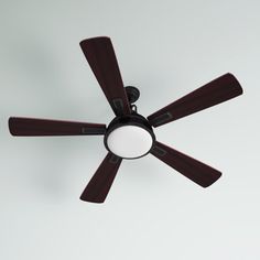 a ceiling fan with four dark brown blades and a white light on the top of it