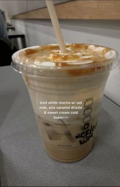 an iced drink with ice cream and caramel on top