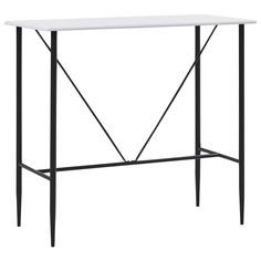 a black table with metal legs and an iron frame on the top, against a white background