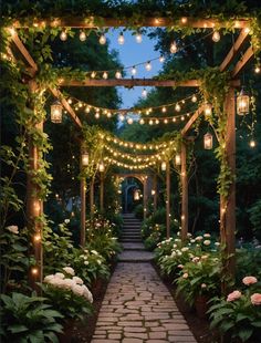 an outdoor walkway with lights strung over it