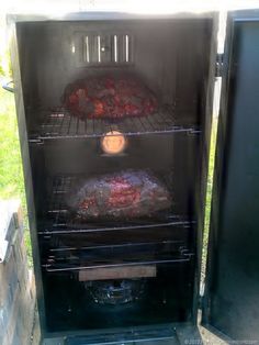 an open oven with food cooking in it's door and on the outside side