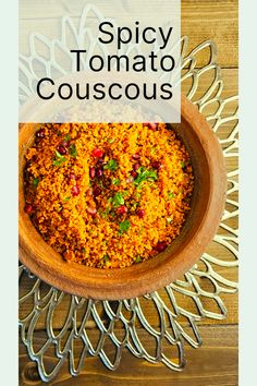 spicy tomato couscous in a wooden bowl with text overlay that reads spicy tomato couscous