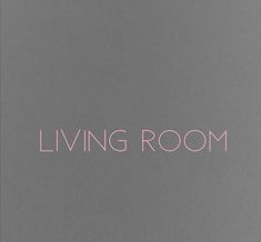 the words living room written in pink on a gray background