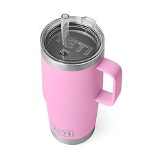 a pink coffee cup with a lid and handle is shown in front of a white background