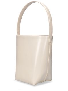 Height: 25cm Width: 22cm Depth: 12cm. Single top handle. Lace-up closure. Logo detail Designer Handheld Bucket Bag With Handle Drop, Luxury Handheld Bucket Bag For Office, Cream Rectangular Bucket Bag For Evening, Designer Handheld Bucket Bag For Formal Occasions, Evening Bucket Box Bag With Handles, Chic Handheld Bucket Bag For Formal Events, Bucket Box Bag With Handles For Evening, Classic Handheld Bucket Bag For Shopping, Classic Handheld Bucket Bag