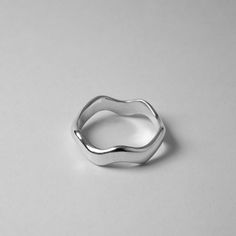 The ocean-inspired design of this Wavelet Ring represents our interpretation of the ocean's continuous rise and fall, creating an uninterrupted circle to symbolise the ocean's infinite nature. Each piece is hand-carved and uniquely formed, ensuring a one-of-a-kind ring every time. The Wavelet Ring is an expression of love for the unpredictable seas and oceans, capturing their essence in a beautifully crafted piece of jewellery.  𝗦𝗛𝗔𝗣𝗘 𝗔𝗡𝗗 𝗦𝗜𝗭𝗜𝗡𝗚 The Wavelet Ring is available in hig Sharp Objects, Ocean Inspired, Silver Rings Handmade, Ocean Inspiration, Ring Sterling Silver, Message Card, Ring Handmade, Queensland, Sterling Ring