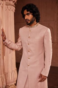 Pink sherwani with geometric woven motifs and cutdana embroidered collar. Paired with kurta and pant. - Aza Fashions Luxury Men's Sherwani With Traditional Drape, Luxury Men's Traditional Drape Sherwani, Designer Semi-formal Kurta With Resham Embroidery, Designer Semi-formal Kurta For Transitional Seasons, Designer Traditional Wear With Zari Work For Semi-formal Occasions, Designer Traditional Wear With Zari Work For Semi-formal Events, Designer Unstitched Semi-formal Traditional Wear, Fitted Resham Embroidery Kurta For Semi-formal Occasions, Semi-formal Fitted Traditional Wear With Naqshi