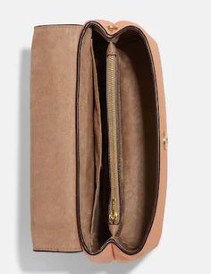 Refined pebble leather and nappa leatherInside zip and multifunction pocketsMagnetic snap closure, fabric liningOutside open pocketHandles convert to shoulder strap with 21 3/4" drop10 1/4" (L) x 6 3/4" (H) x 3 3/4" (W)Style No. CA145Color: Faded Blush Multi Leather Double Flap Satchel With Removable Pouch, Coach Beige Shoulder Bag With Zipper Closure, Coach Cream Shoulder Bag With Zipper Closure, Coach Clutch With Detachable Strap, Rectangular, Coach Clutch Bag With Gold-tone Hardware, Pink Coach Shoulder Bag With Gold-tone Hardware, Sling Backpack, Pebbled Leather, Shoulder Strap