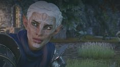 a woman with white hair and green eyes in a screenshot from the elder scrolls