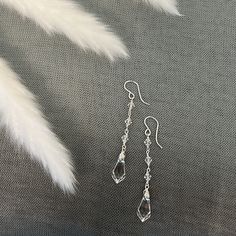 Unique Earrings Silver, Clear Crystal Dangle Earrings, Clear Crystal Pierced Earrings, Elegant Long Drop Crystal Earrings With Dangling Beads, Elegant Teardrop Crystal Earrings With Dangling Beads, Crystal Dangle Bridal Earrings, Faceted Crystal Dangle Earrings, Single Long Drop Crystal Earring, Faceted Crystal Party Earrings