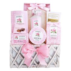 a pink gift basket filled with personal care items