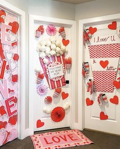 valentine's day decorations are displayed on the front door