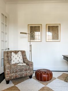 a living room filled with furniture and decor