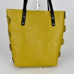 What a gorgeous mustard yellow purse/tote bag! This purse is made with 100% leather and is put together totally with rivets. The black straps are also oil tanned leather. The inside is not lined and that gives this tote that really cool look. Very roomy! The bottom of the purse has metal purse feet. Also, available in a light-colored leather with ostrich print. Size: 13” tall x 13” wide x 5” deep [33cm x 33cm x 13cm] Colors on the screen are as true as possible. Please realize that all monitors Modern Tote Bucket Bag With Snap Closure, Modern Bucket Bag Tote With Snap Closure, Modern Snap Closure Bucket Tote Bag, Modern Bucket Bag With Snap Closure For Daily Use, Modern Bags With Snap Closure For Shopping, Modern Shopping Bags With Snap Closure, Modern Shoulder Bag With Snap Closure For Shopping, Modern Hobo Bag With Snap Closure For Daily Use, Trendy Yellow Bucket Bag For Everyday