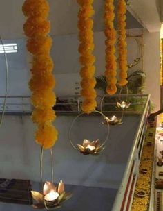 flowers hanging from the ceiling in a store