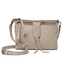 - Detachable Adjustable Shoulder Strap - Top Zip Closure - Exterior Features Back Slip Pocket And Foldover Woven Strap - Interior Features Zip And Slip Compartments, 8 Card Slots - Approx. 5 1/4" H X 7" W X 1" D - Approx. 25-30" Strap Drop - Materials: Leather Exterior, Textile Lining Versatile Beige Crossbody Clutch, Beige Crossbody Clutch For Everyday Use, Versatile Beige Leather Clutch, Chic Convertible Shoulder Bag For Everyday, Everyday Taupe Crossbody Bag, Taupe Crossbody Bag For Everyday Use, Versatile Taupe Crossbody Bag, Everyday Convertible Shoulder Bag, Convertible Crossbody Bag For Everyday