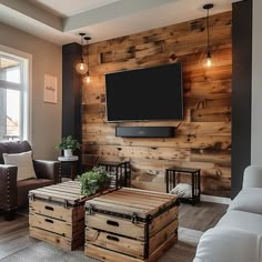 a living room with wooden walls and furniture