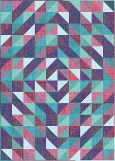 a colorful quilt that has been made with different colors and shapes, including the diagonals