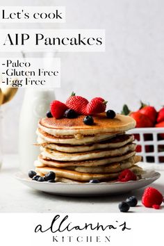 a stack of pancakes with berries on top and the words let's cook app pancakes