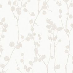 a white wallpaper with branches and flowers on it