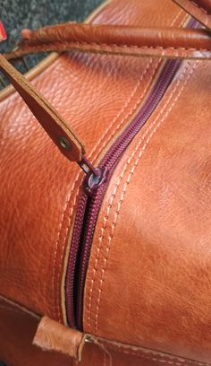 "Welcome! Amazing Leather Bag In Very good condition. Only small signs of use and small stain in the base of bag! One compartment outside Dimensions: - Tall: 10.23\" (26 cm) - Deep: 10.23\" (26 cm) - W: 19.29\" (49 cm) - Handles: 23.62\" (60 cm) Thanks for stopping by!!IMPORTANT: Due to the delicate situation We're all going through, and in order to keep the safety of courier workers too, all orders will be dispatched when alert sanitary finished. You can purchased or reserve items like always. Brown Leather-lined Satchel Travel Bag, Brown Leather Lined Satchel Travel Bag, Brown Satchel Travel Bag With Leather Lining, Vintage Smooth Grain Shoulder Bag For Travel, Brown Smooth Grain Satchel Travel Bag, Camel Leather Bag With Zipper Closure, Brown Leather Lined Shoulder Duffle Bag, Brown Duffle Bag With Leather Lining, Brown Shoulder Duffle Bag With Leather Lining