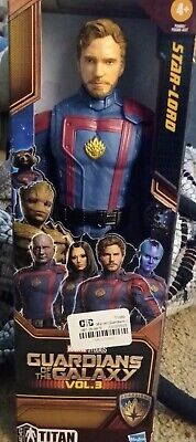 the action figure has been set up in a box with other figures on it, including captain