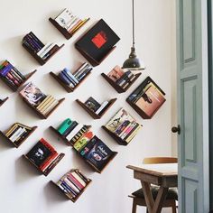 the bookshelves are arranged on the wall to create a unique display for your book collection