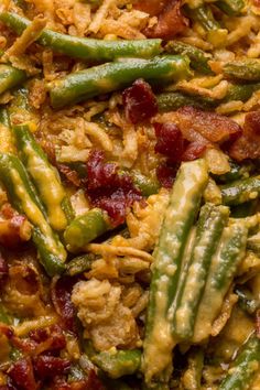 green beans and other vegetables are mixed together in a casserole dish with bacon