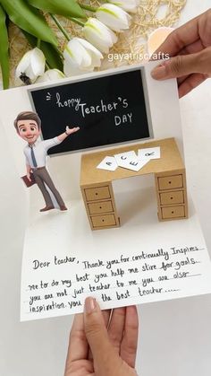 someone is holding up a card with a teacher's day message in front of them