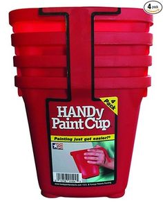 the handy paint cup is red and has six cups in it, each with one hand on