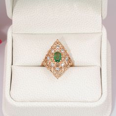 Feel free to contact us to make a custom order inquiry. Emerald Ring with diamonds is a beautiful creation in Yellow Gold embellished with classical ornamental leaves design, accented with Natural Zambian Faceted Emerald and White Diamonds. Materials: 14K Yellow Gold, 0.5ct Natural Faceted Emerald, 8 White Natural Diamonds totaling .24cts. Available in 14K and 18K Yellow Gold Emerald Ring With Diamonds, Gold Infinity Ring, Emerald Ring Vintage, Green Gemstone Ring, Natural Emerald Rings, Green Emerald Ring, Emerald And Diamond Ring, Gift For Anniversary, Emerald Diamond Ring