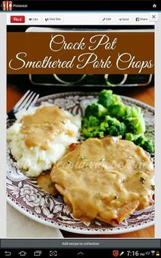 a plate with gravy, mashed potatoes and broccoli on it