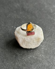 7.5 Natural Amber and Rough Pink Tourmiline 925 silver ring  ✓You'll receive your new ring in the signature gift box ✓Because of the natural crystal structure, natural  gemstones could have some small visible scars and crackles. ✓ Solid 925 Sterling Silver (925 parts per 1000) ✓ Silver Hallmark on every item ✓ Handcrafted  ✓ Every natural stone is different and exclusive in pattern and shape, and with its unique properties Crystal Structure, Natural Amber, Multi Stone, Multi Stone Ring, 925 Silver Rings, Natural Crystals, Solid 925 Sterling Silver, Stone Rings, Amber